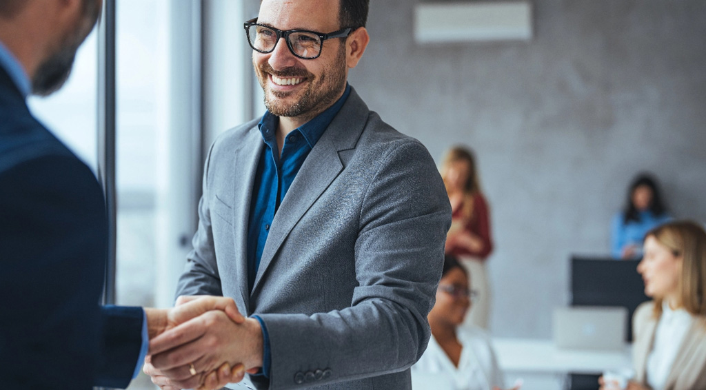 Business men shaking hands mobile