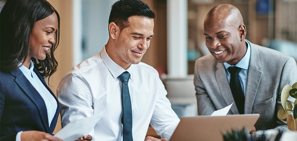 Business professionals working on project in boardroom mobile