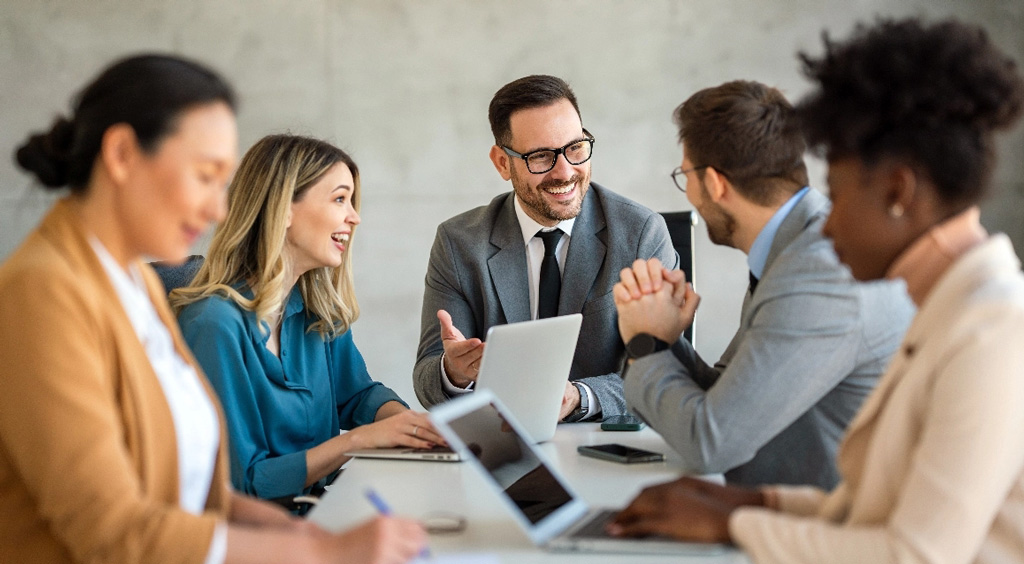 Business team in boardroom tablet