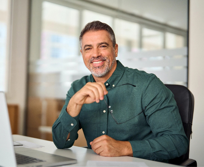Middle aged professional man at desk