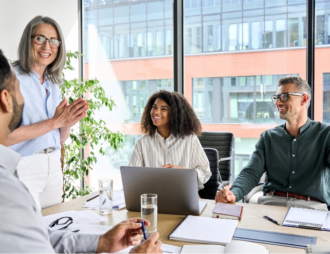 Older female executive business people discuss corporate project