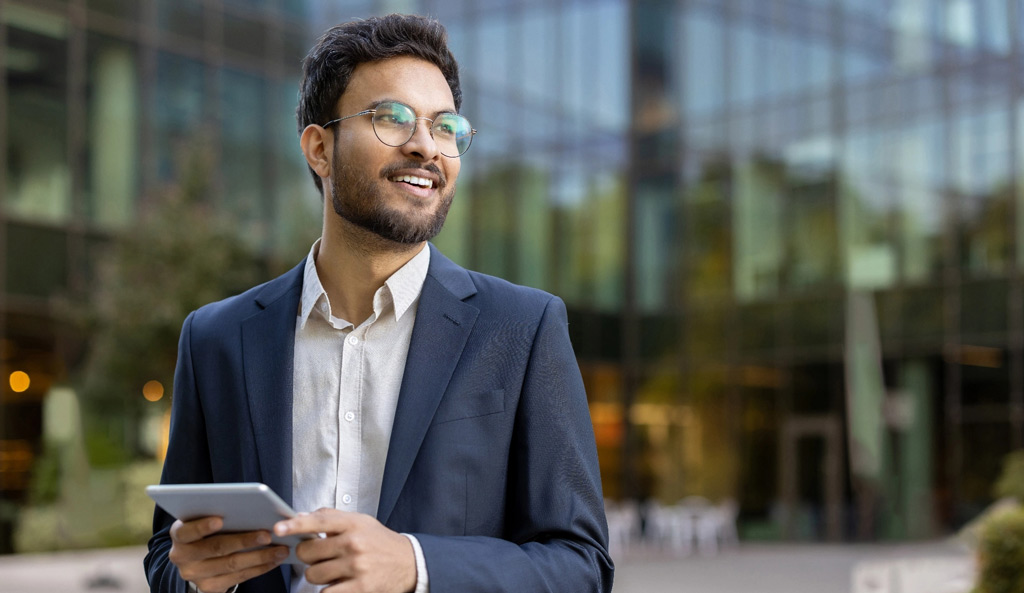 Young business man professional portrait tablet