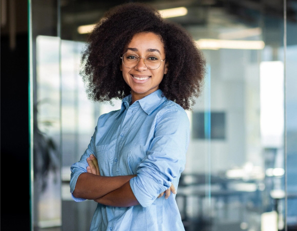 Young business woman with arms folded
