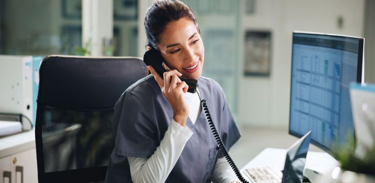 Nurse taking appointment phone call 768x374